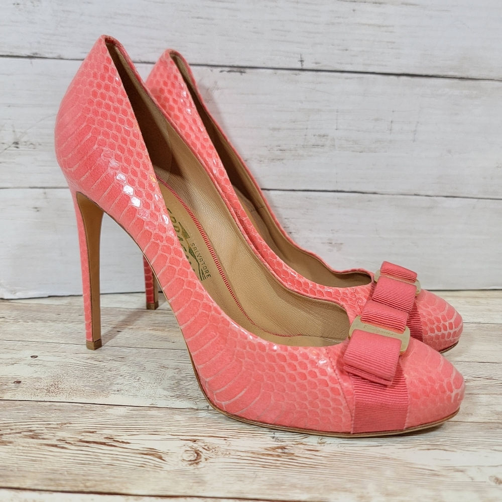Salvatore Ferragamo Vara bow platform pumps in a coral python embossed leather